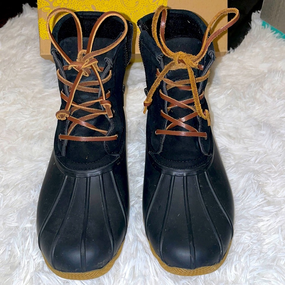 Black duck boots with brown laces